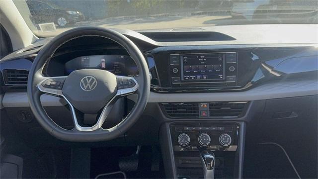 used 2023 Volkswagen Taos car, priced at $19,570