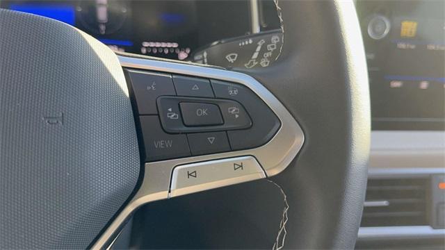 used 2025 Volkswagen Taos car, priced at $27,522