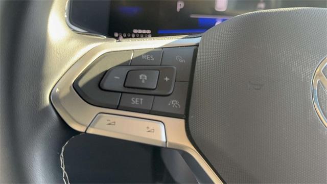 used 2025 Volkswagen Taos car, priced at $27,522