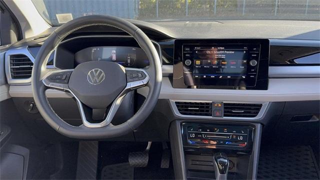 used 2025 Volkswagen Taos car, priced at $27,522