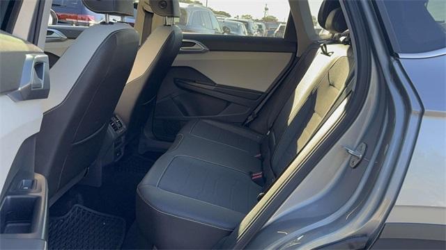 used 2025 Volkswagen Taos car, priced at $27,522