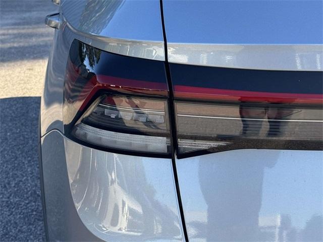 used 2025 Volkswagen Taos car, priced at $27,522