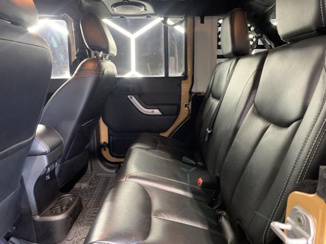 used 2014 Jeep Wrangler Unlimited car, priced at $21,495