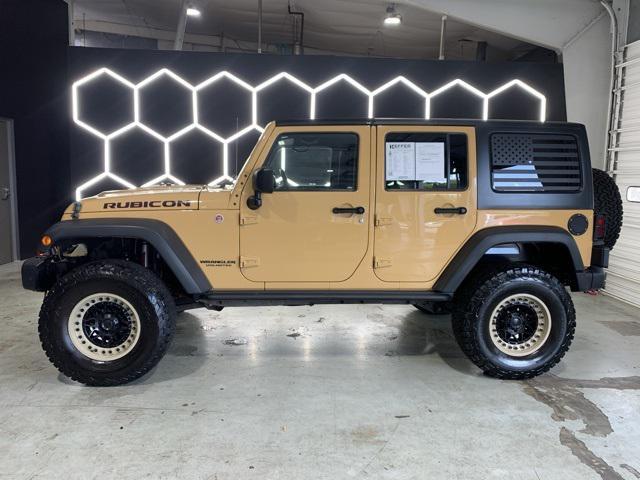 used 2014 Jeep Wrangler Unlimited car, priced at $21,495