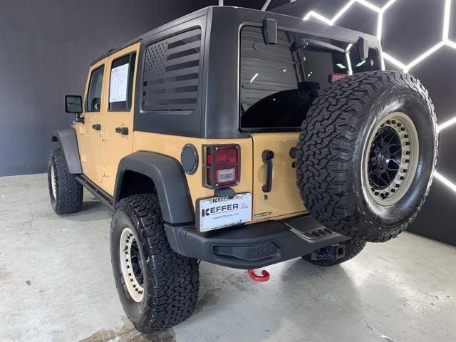 used 2014 Jeep Wrangler Unlimited car, priced at $21,495