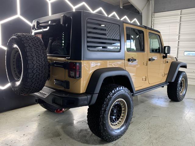 used 2014 Jeep Wrangler Unlimited car, priced at $21,495