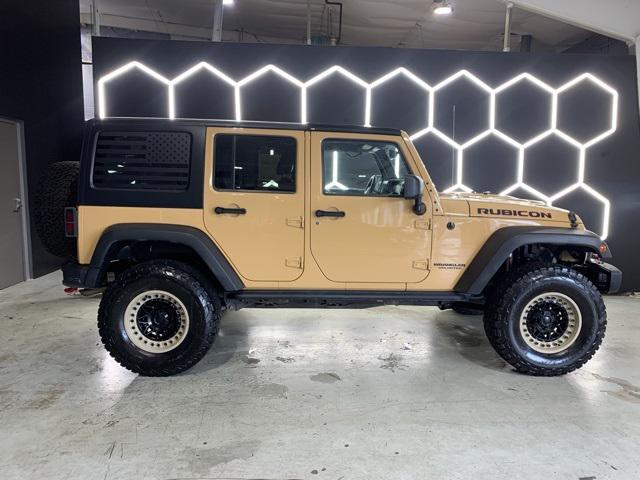 used 2014 Jeep Wrangler Unlimited car, priced at $21,495