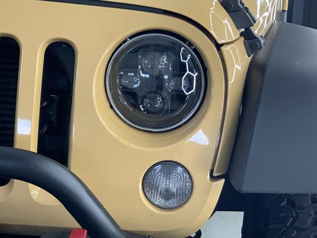 used 2014 Jeep Wrangler Unlimited car, priced at $21,495