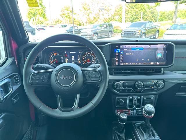 used 2024 Jeep Wrangler car, priced at $49,487