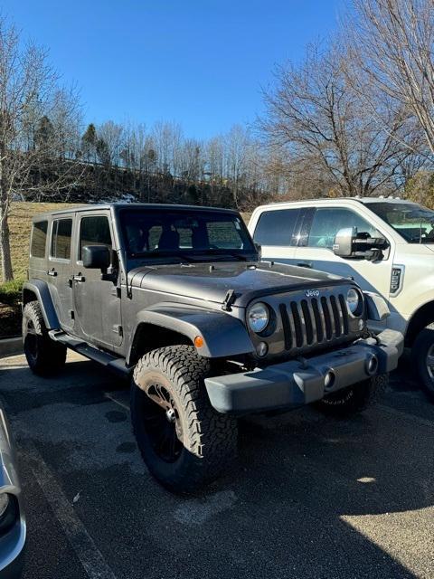 used 2014 Jeep Wrangler Unlimited car, priced at $20,987