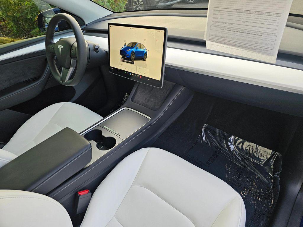 used 2025 Tesla Model Y car, priced at $39,995