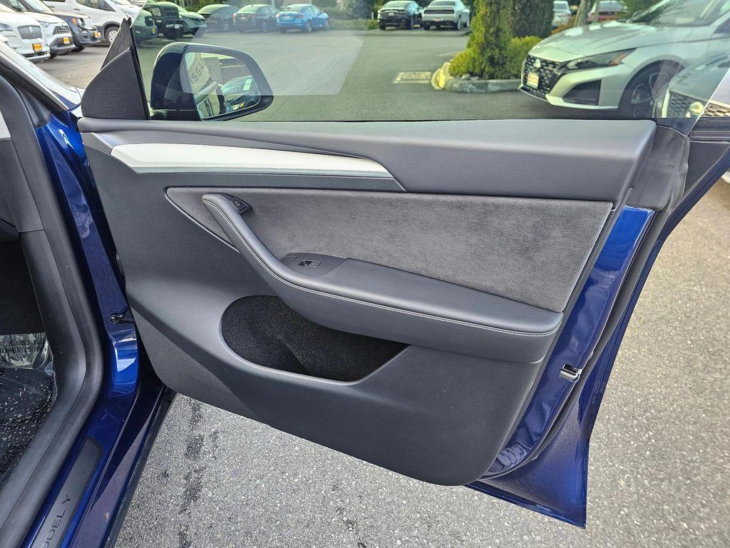 used 2025 Tesla Model Y car, priced at $39,995