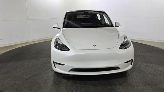 used 2023 Tesla Model Y car, priced at $29,879