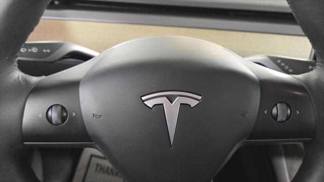 used 2023 Tesla Model Y car, priced at $29,879