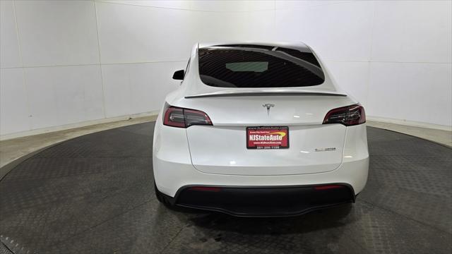 used 2023 Tesla Model Y car, priced at $29,879