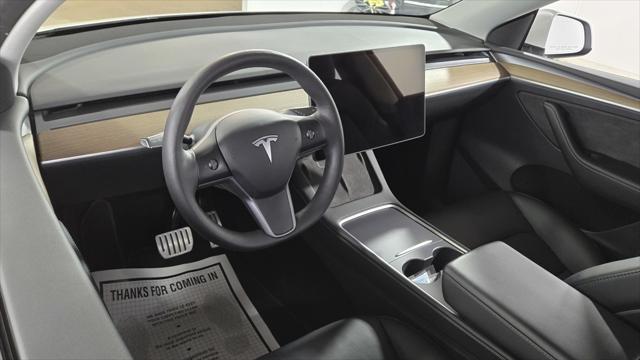 used 2023 Tesla Model Y car, priced at $29,879