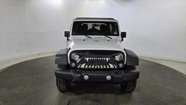 used 2015 Jeep Wrangler Unlimited car, priced at $14,563