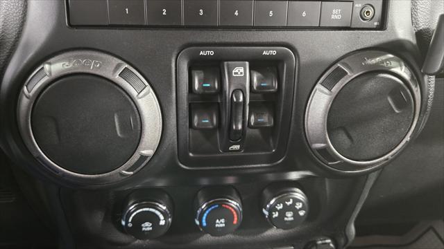 used 2015 Jeep Wrangler Unlimited car, priced at $14,563