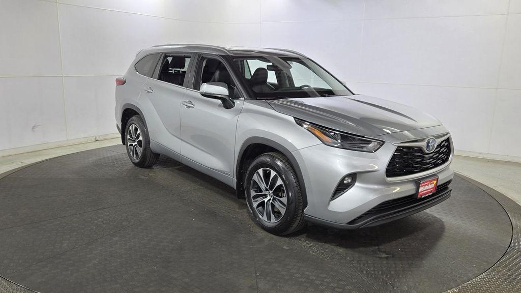 used 2022 Toyota Highlander Hybrid car, priced at $28,601