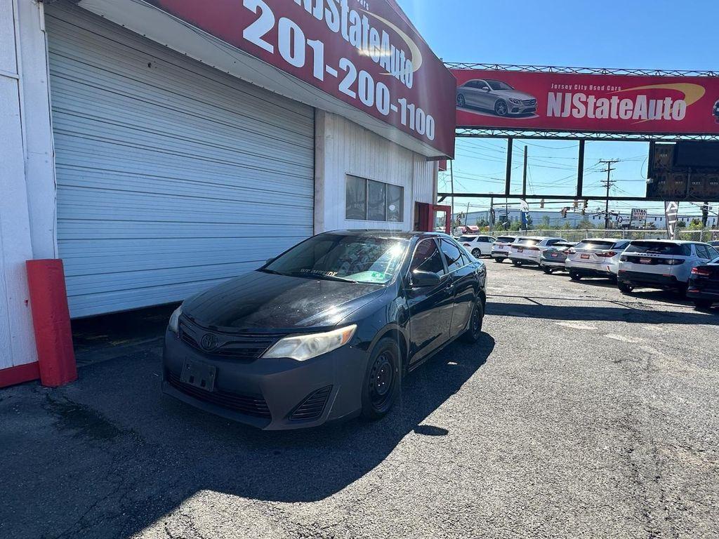 used 2014 Toyota Camry car, priced at $4,900