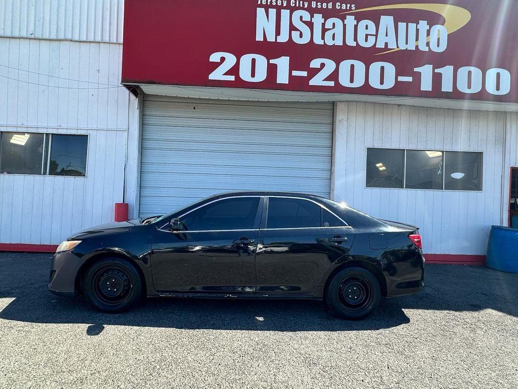 used 2014 Toyota Camry car, priced at $4,600