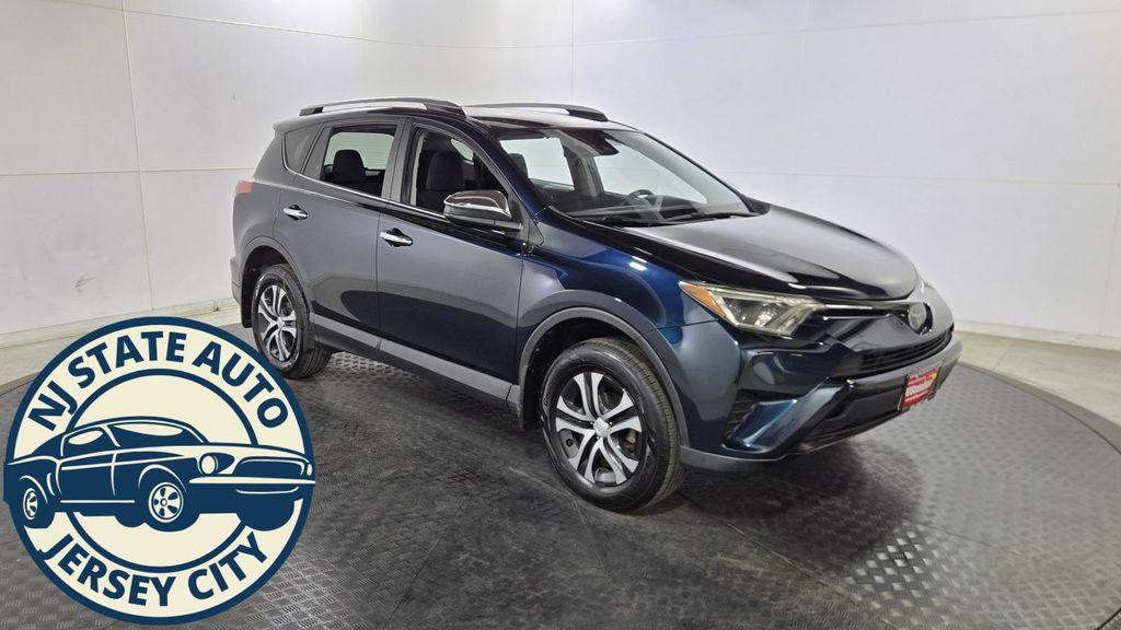 used 2018 Toyota RAV4 car, priced at $17,283