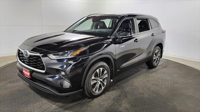 used 2021 Toyota Highlander Hybrid car, priced at $30,150