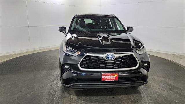 used 2021 Toyota Highlander Hybrid car, priced at $30,150