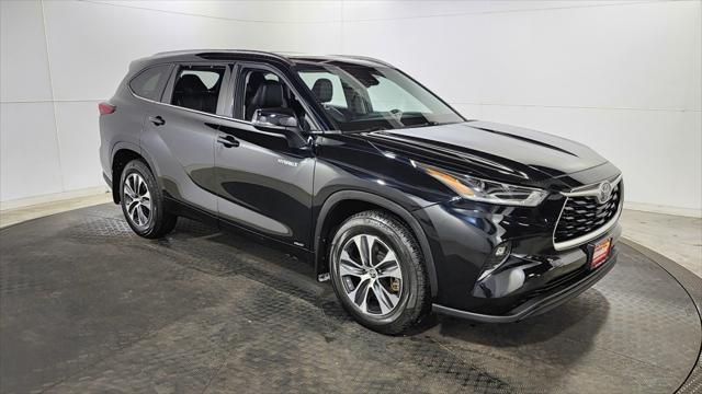 used 2021 Toyota Highlander Hybrid car, priced at $30,150