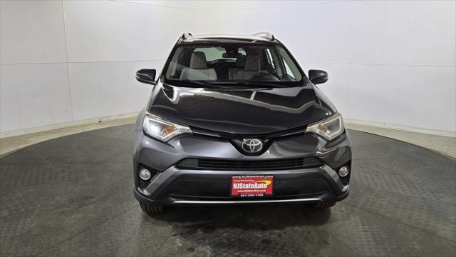 used 2018 Toyota RAV4 car, priced at $15,690