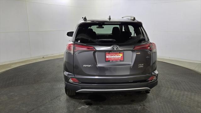 used 2018 Toyota RAV4 car, priced at $15,690