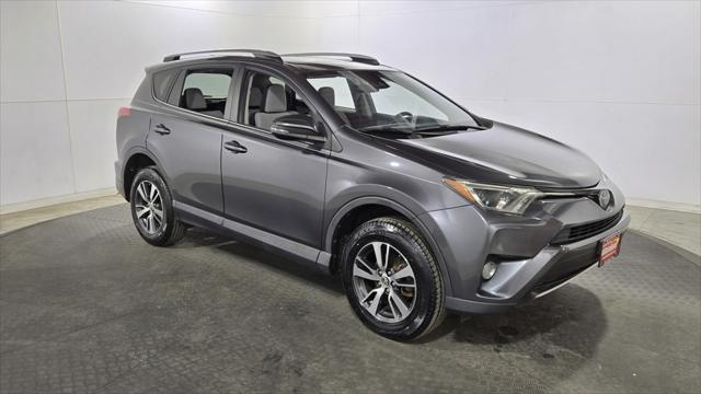 used 2018 Toyota RAV4 car, priced at $15,690