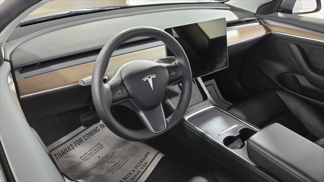 used 2023 Tesla Model 3 car, priced at $24,108