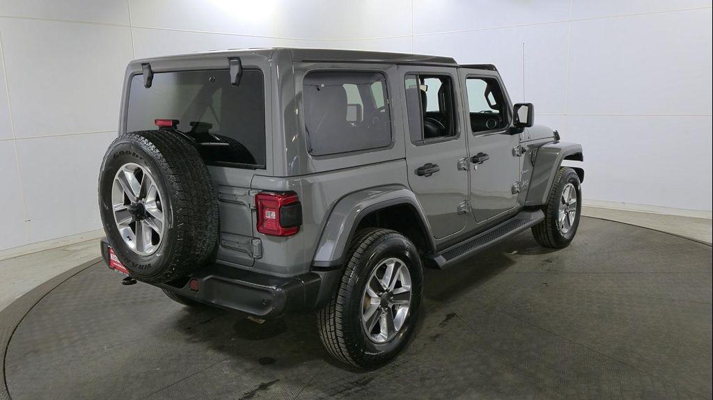 used 2021 Jeep Wrangler Unlimited car, priced at $24,797