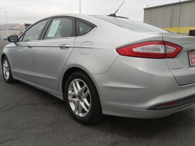 used 2015 Ford Fusion car, priced at $7,990