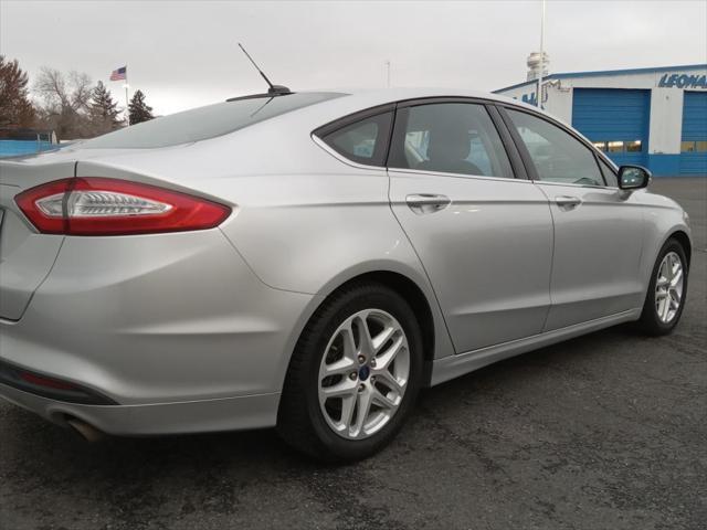 used 2015 Ford Fusion car, priced at $7,990