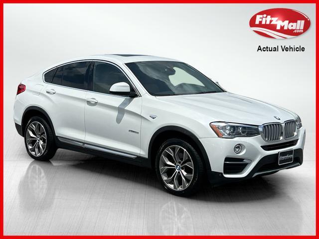 used 2018 BMW X4 car, priced at $18,977