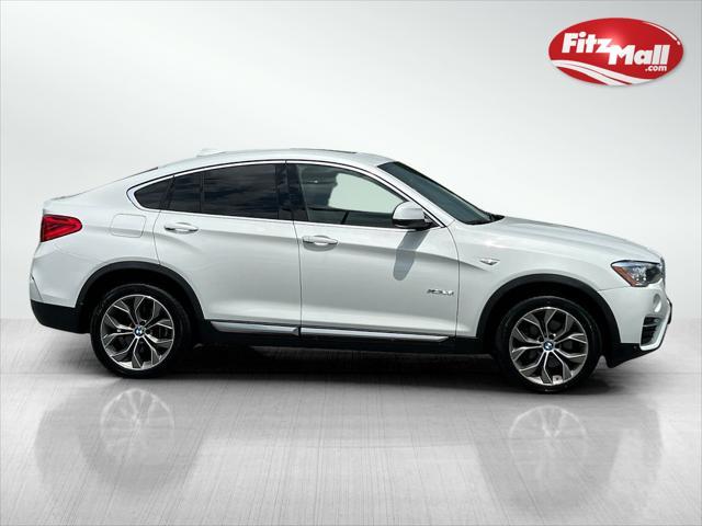 used 2018 BMW X4 car, priced at $18,977