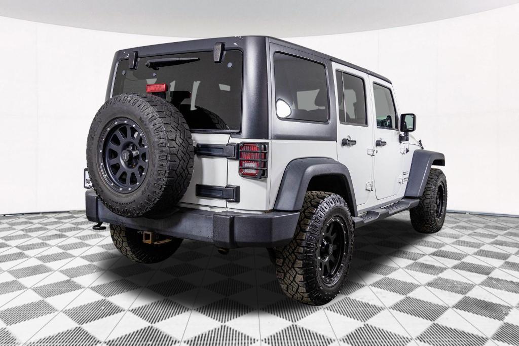 used 2014 Jeep Wrangler Unlimited car, priced at $15,977