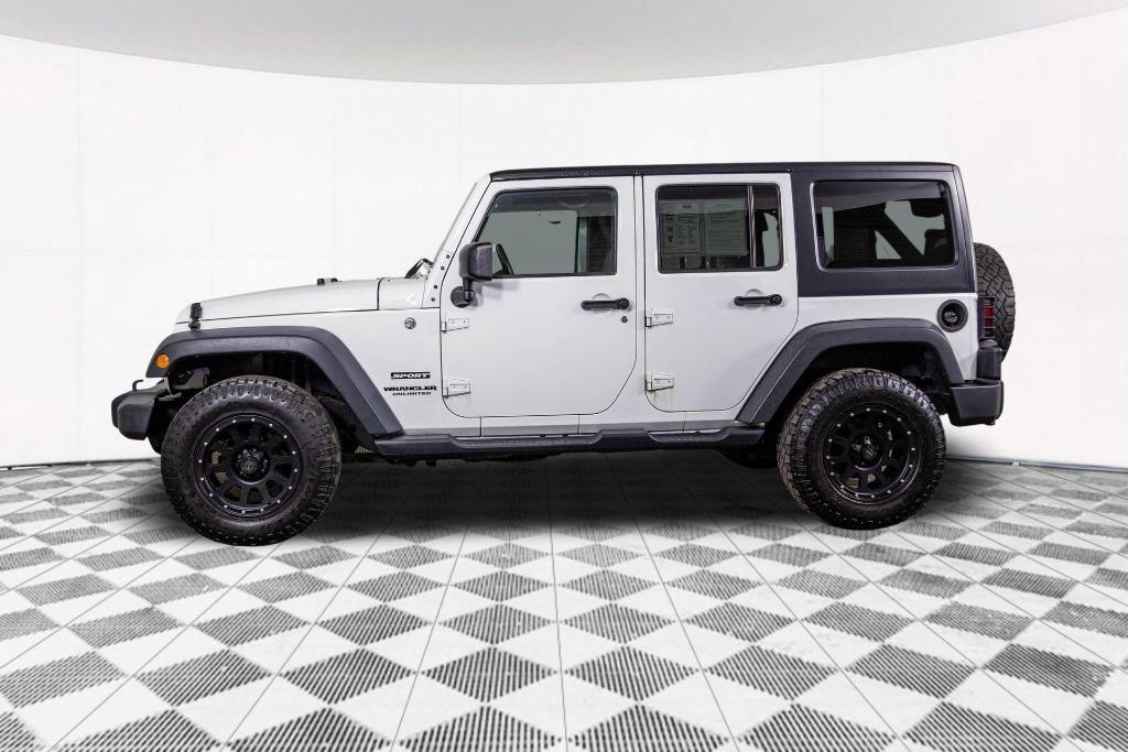used 2014 Jeep Wrangler Unlimited car, priced at $15,977
