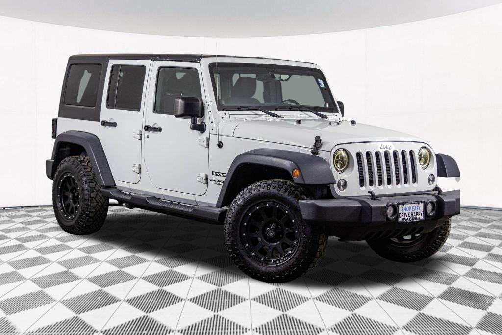 used 2014 Jeep Wrangler Unlimited car, priced at $16,477