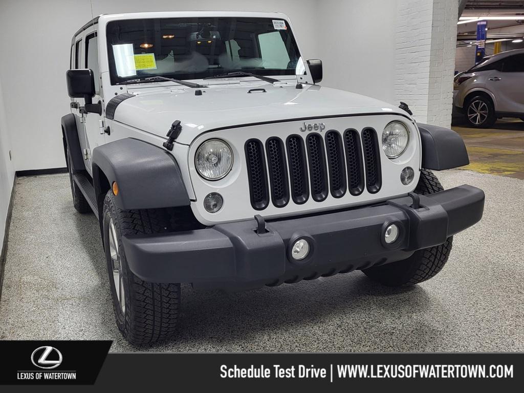 used 2014 Jeep Wrangler Unlimited car, priced at $19,444