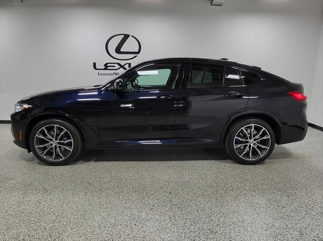 used 2023 BMW X4 car, priced at $52,649