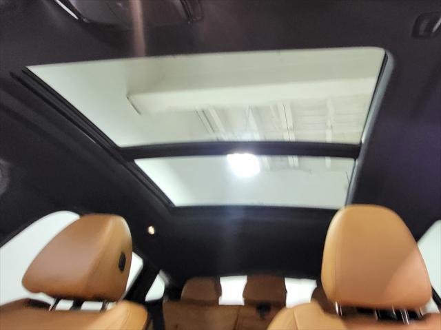used 2023 BMW X4 car, priced at $52,649