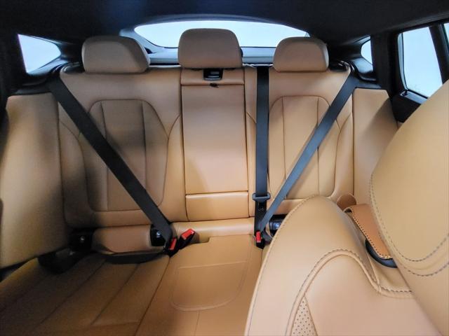 used 2023 BMW X4 car, priced at $52,649