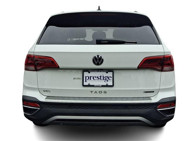 used 2022 Volkswagen Taos car, priced at $23,077