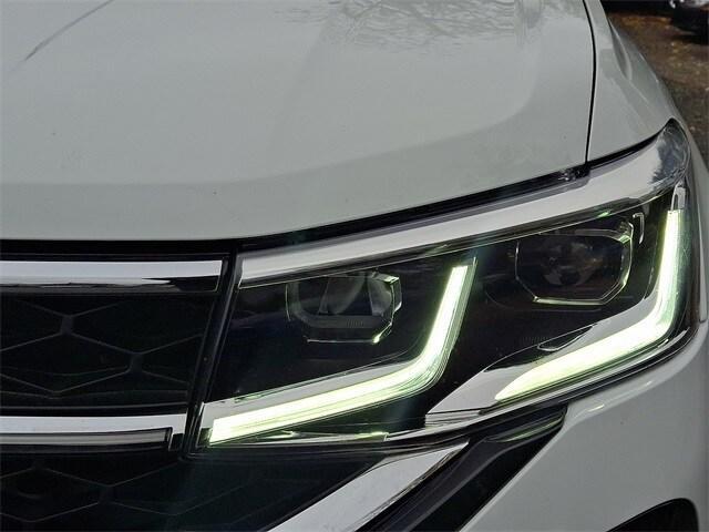 used 2022 Volkswagen Taos car, priced at $23,077