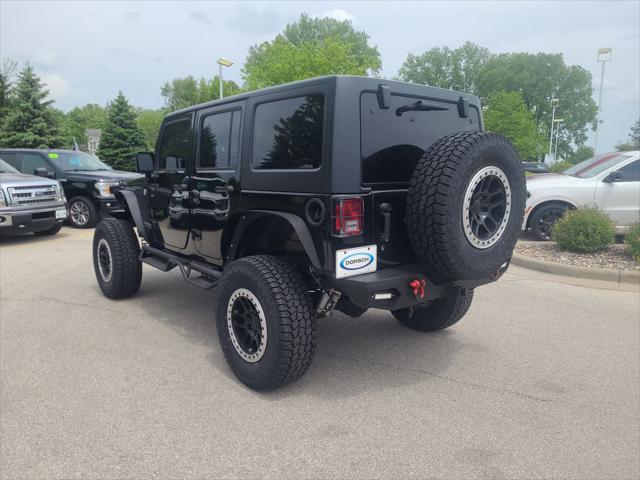 used 2017 Jeep Wrangler Unlimited car, priced at $24,693