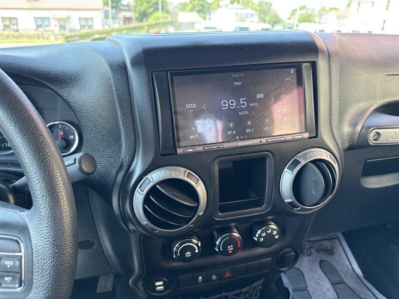 used 2015 Jeep Wrangler car, priced at $13,900