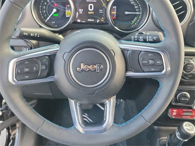 used 2023 Jeep Wrangler 4xe car, priced at $31,494